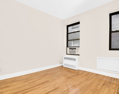 East 25th Street - Photo Thumbnail 2