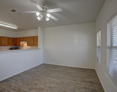 1102 E 3rd St - Photo Thumbnail 5