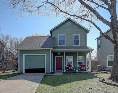 1102 E 3rd St - Photo Thumbnail 2