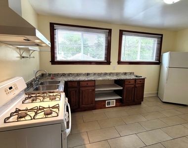 1143 E 81st Place - Photo Thumbnail 8