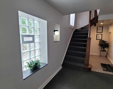 1143 E 81st Place - Photo Thumbnail 1