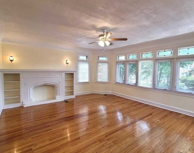 1143 E 81st Place - Photo Thumbnail 2