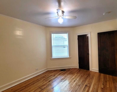 1143 E 81st Place - Photo Thumbnail 4
