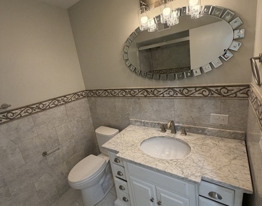 8908 Ozark Avenue - Photo Thumbnail 4