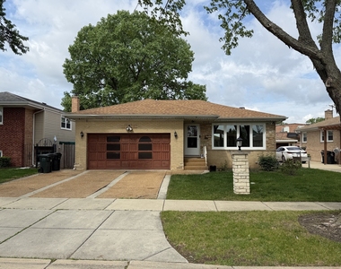 8908 Ozark Avenue - Photo Thumbnail 1