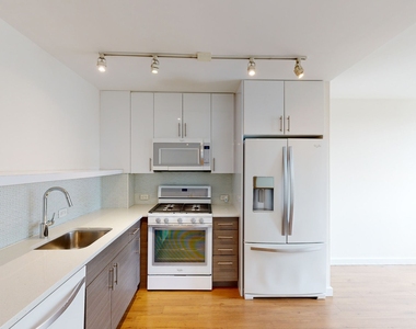 401 E 34th St - Photo Thumbnail 1