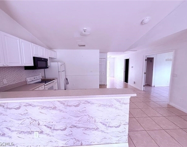 1221 E 12th Street - Photo Thumbnail 6