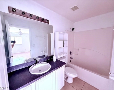 1221 E 12th Street - Photo Thumbnail 10