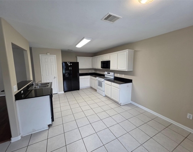 28942 Village Creek Loop - Photo Thumbnail 4