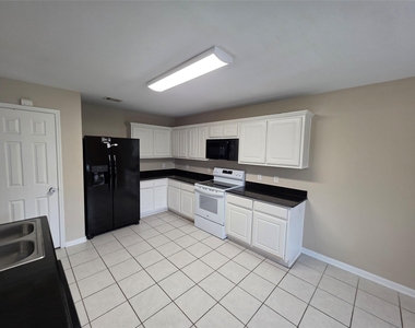 28942 Village Creek Loop - Photo Thumbnail 7