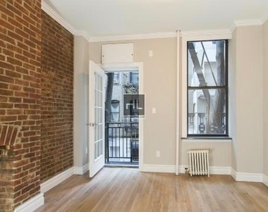 E 7th St. - Photo Thumbnail 2