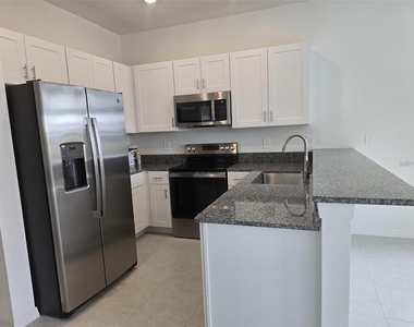 11236 E 65th Terrace E - Photo Thumbnail 7