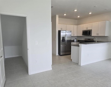 11236 E 65th Terrace E - Photo Thumbnail 4