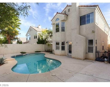 8008 Dover Shores Avenue - Photo Thumbnail 2