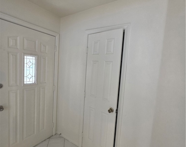 8008 Dover Shores Avenue - Photo Thumbnail 69