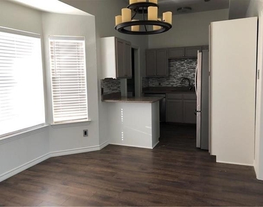 3228 N Bell Avenue - Photo Thumbnail 2