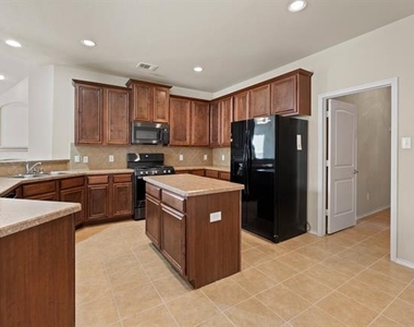 9716 Mulligan Drive - Photo Thumbnail 10
