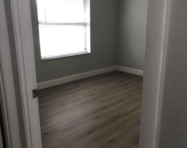 5862 Triphammer Road - Photo Thumbnail 5