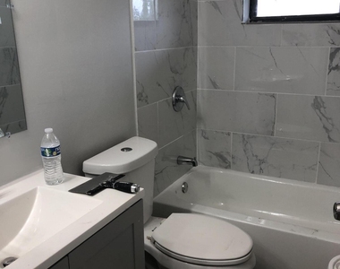5862 Triphammer Road - Photo Thumbnail 2