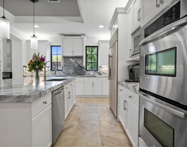 9521 Eden Manor - Photo Thumbnail 54