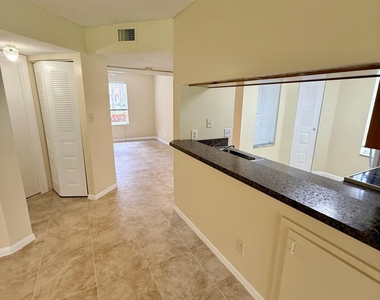 1142 Coral Club Drive - Photo Thumbnail 4