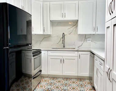 8310 Regents Rd - Photo Thumbnail 8