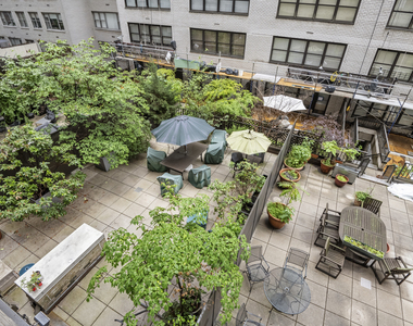 225 E 57th St - Photo Thumbnail 2