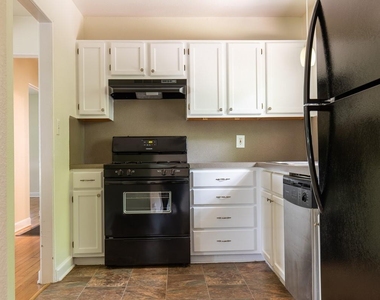 5514 Grover Ave - Photo Thumbnail 3