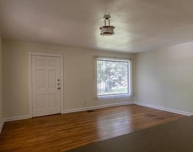 5514 Grover Ave - Photo Thumbnail 2