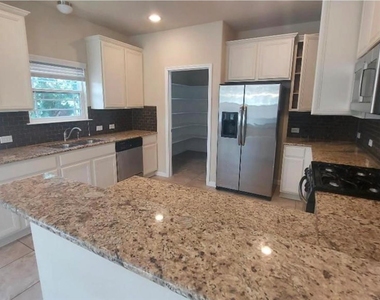 8404 Harrier Dr - Photo Thumbnail 8