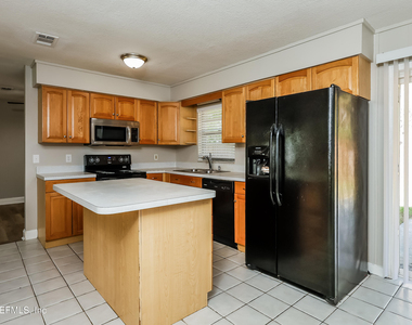 7930 Rondeau Drive E - Photo Thumbnail 2