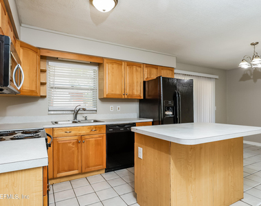 7930 Rondeau Drive E - Photo Thumbnail 1