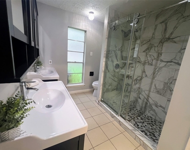 1202 Manorglen Drive - Photo Thumbnail 2