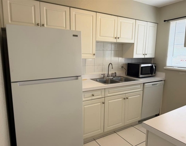 5317 Curry Ford Road - Photo Thumbnail 3