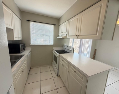 5317 Curry Ford Road - Photo Thumbnail 5