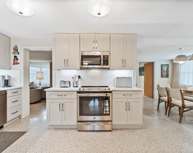 809 E 15th Avenue - Photo Thumbnail 1