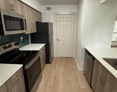 230 E 5th Street - Photo Thumbnail 1