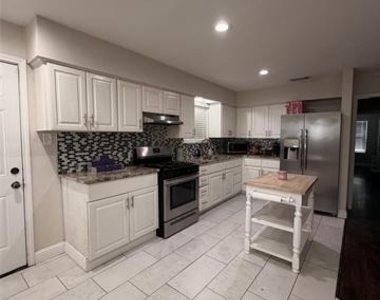 9605 Kittyhawk Lane - Photo Thumbnail 3