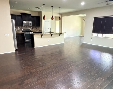 10786 W Yearling Road - Photo Thumbnail 4