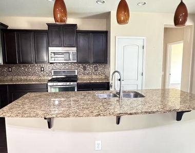 10786 W Yearling Road - Photo Thumbnail 8