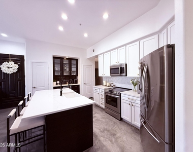 11000 N 77th Place - Photo Thumbnail 2