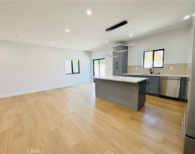 7744 1/2 Vassar Avenue - Photo Thumbnail 1