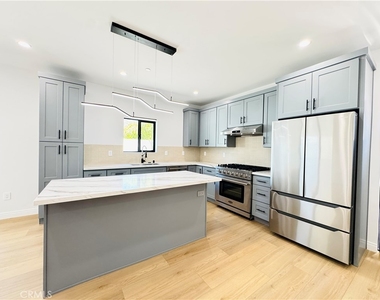 7744 1/2 Vassar Avenue - Photo Thumbnail 8