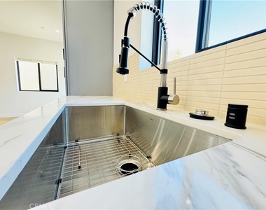 7744 1/2 Vassar Avenue - Photo Thumbnail 6