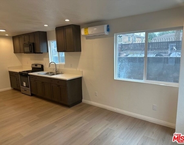 1012 E 73rd Street - Photo Thumbnail 4