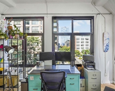 330 W 11th Street - Photo Thumbnail 1
