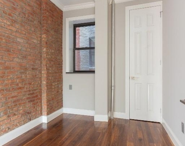East 116th Street - Photo Thumbnail 3