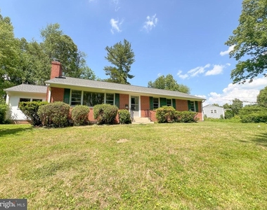 10001 Woodhill Road - Photo Thumbnail 1