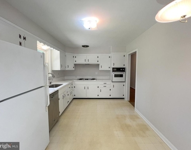 10001 Woodhill Road - Photo Thumbnail 8