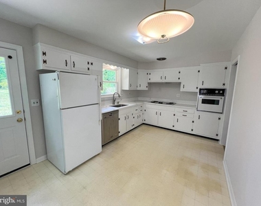 10001 Woodhill Road - Photo Thumbnail 7